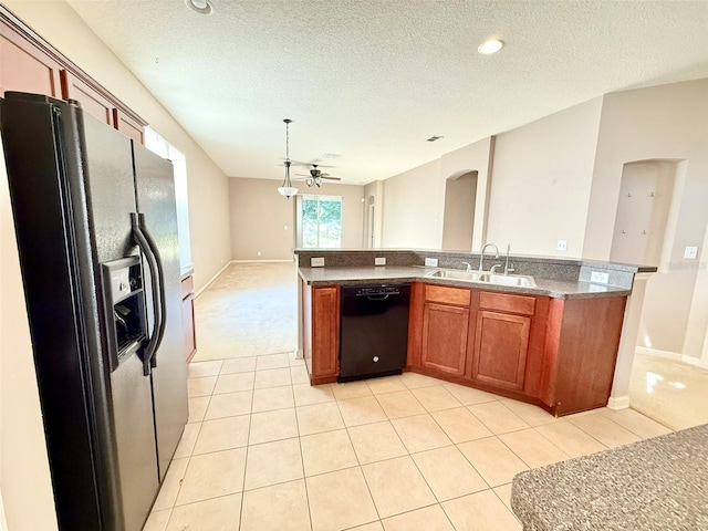 kitchen with ceiling fan, light tile patterned floors, stainless steel fridge with ice dispenser, dishwasher, and sink