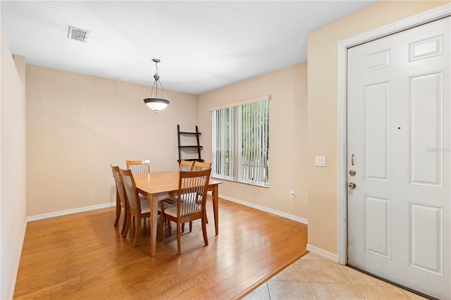 dining room featuring light hardwood / wood-style floors