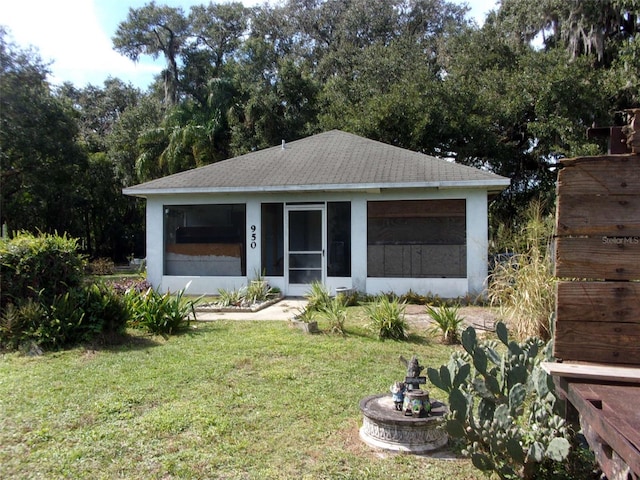 view of front of home with a front yard