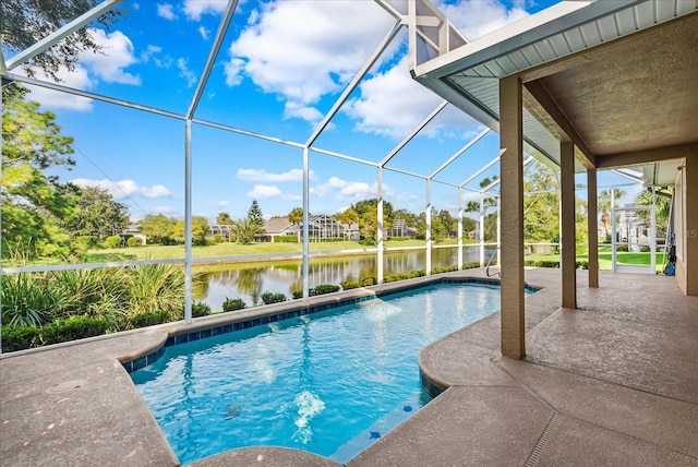 view of pool featuring a patio, a water view, and glass enclosure