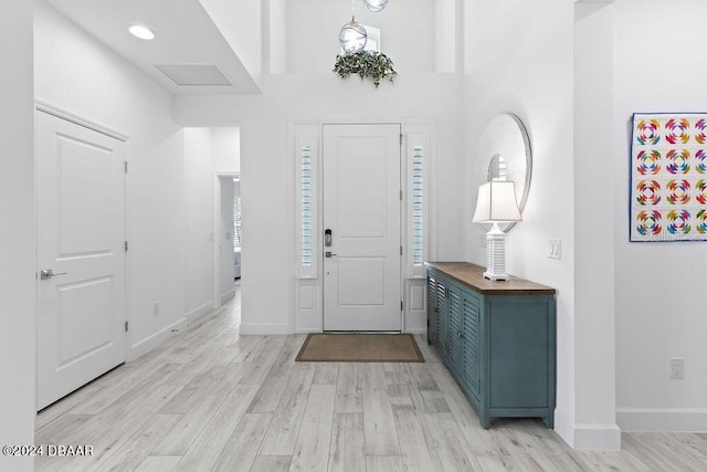 entrance foyer with light hardwood / wood-style floors