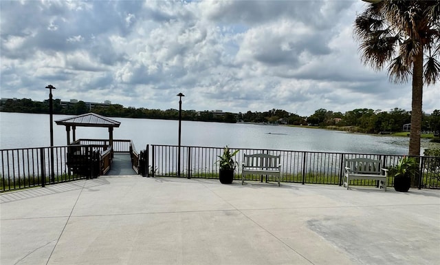 view of patio featuring a water view