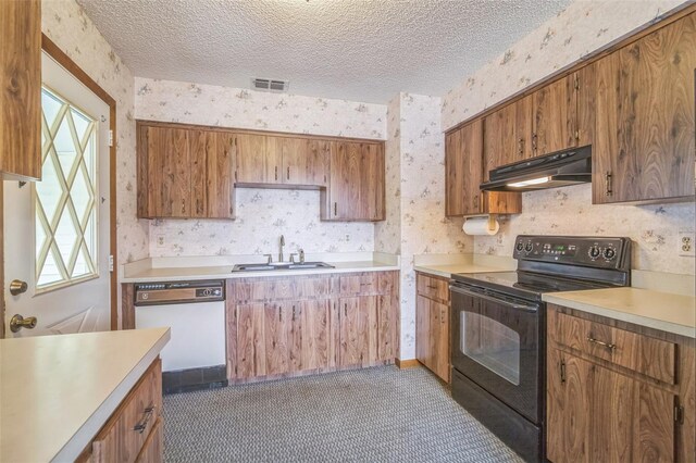 kitchen featuring sink, dark colored carpet, black range with electric cooktop, white dishwasher, and a textured ceiling