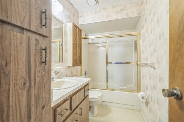 10170 SW 96th Ct, Ocala, FL 34481 - full bathroom with wallpapered walls, a textured ceiling, vanity, toilet, and enclosed tub / shower combo