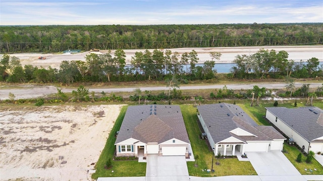 bird's eye view with a forest view