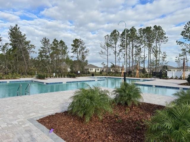 pool featuring a patio