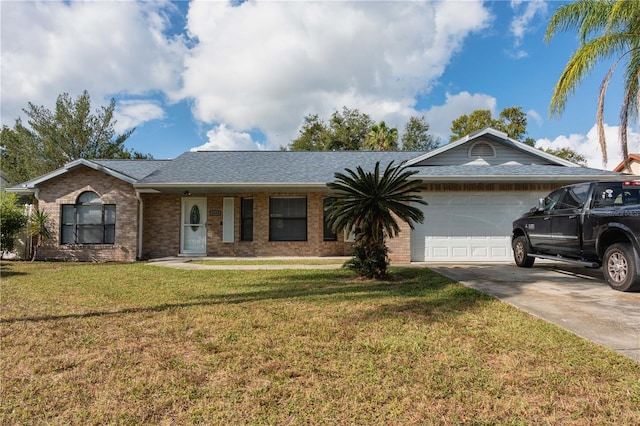 ranch-style home with a front lawn and a garage