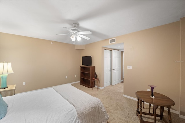 carpeted bedroom featuring ceiling fan