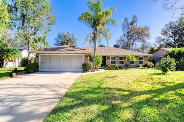 ranch-style home with a front lawn and a garage