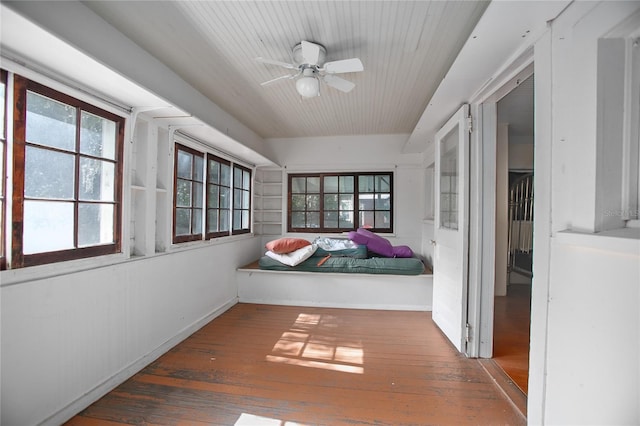 bedroom featuring ceiling fan and dark hardwood / wood-style flooring