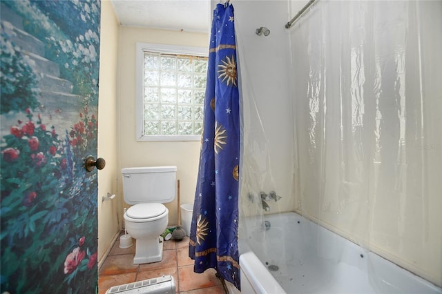 bathroom with toilet, tile patterned flooring, and shower / tub combo