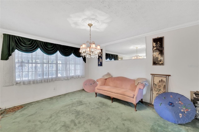 sitting room featuring ornamental molding, a textured ceiling, carpet floors, and an inviting chandelier