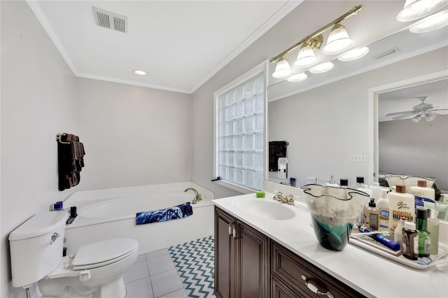 bathroom with vanity, crown molding, a bathtub, and toilet