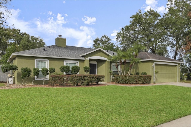 ranch-style home with a front yard and a garage