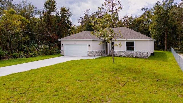 ranch-style home featuring a garage and a front lawn