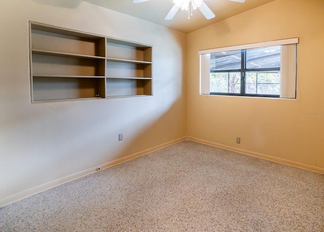 unfurnished room with carpet, vaulted ceiling, and ceiling fan