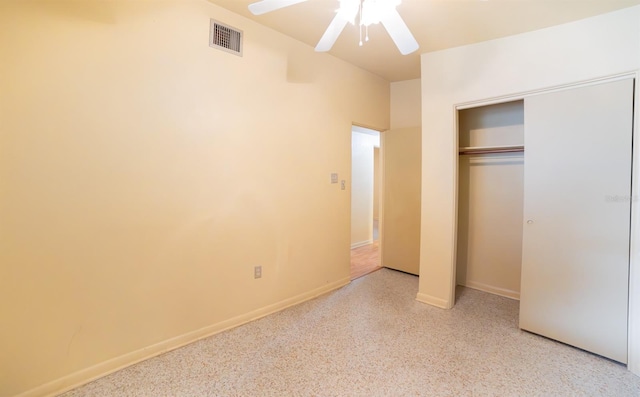 unfurnished bedroom featuring a closet and ceiling fan