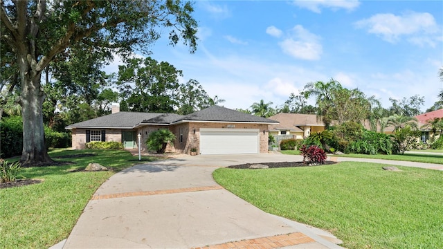 ranch-style home featuring a front lawn and a garage