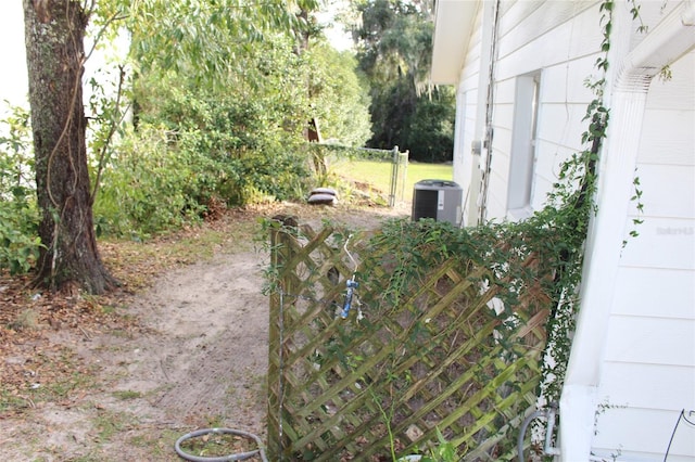 view of yard featuring central AC