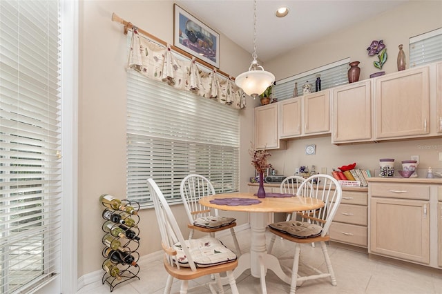 dining room featuring light tile patterned flooring