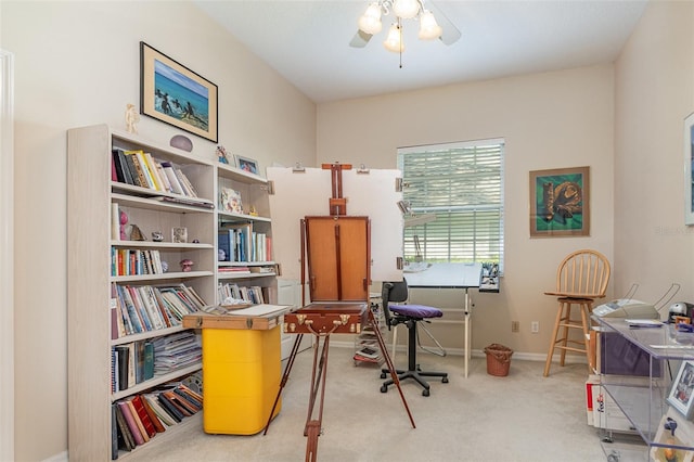 office space featuring ceiling fan and carpet