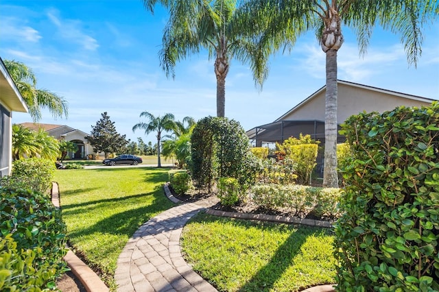 view of yard featuring a lanai