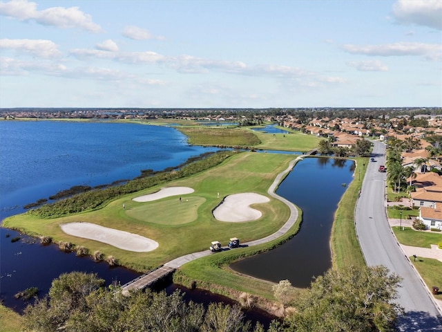 bird's eye view with a water view