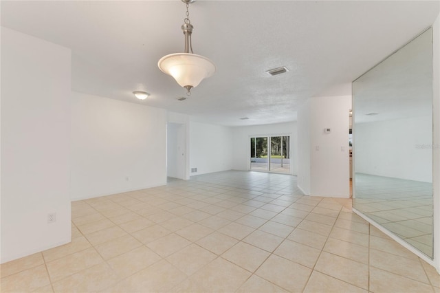 660 Saxon Blvd, Deltona, FL 32725 - spare room with light tile patterned flooring