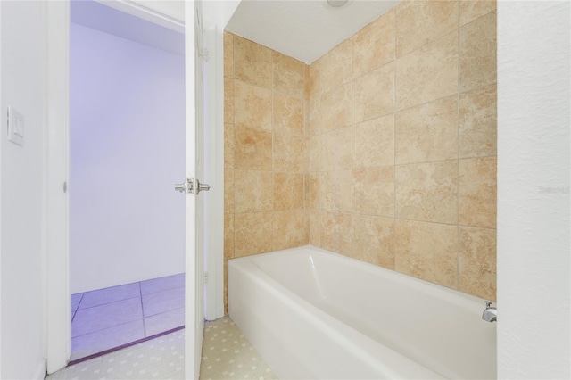 bathroom featuring shower with separate bathtub and tile patterned flooring