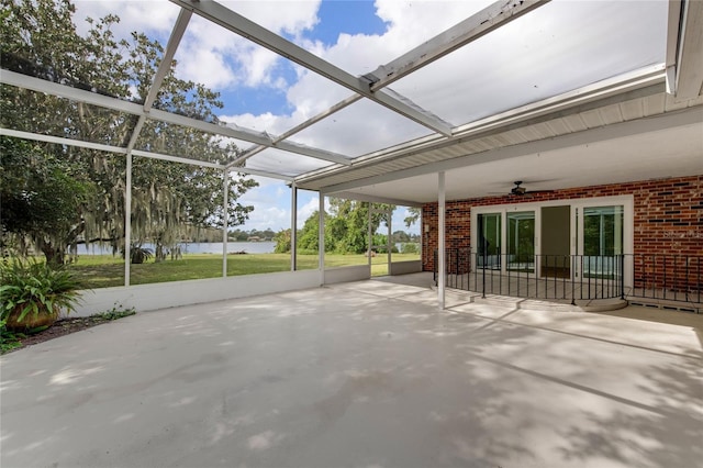 view of patio / terrace with glass enclosure and ceiling fan