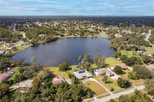 drone / aerial view with a water view