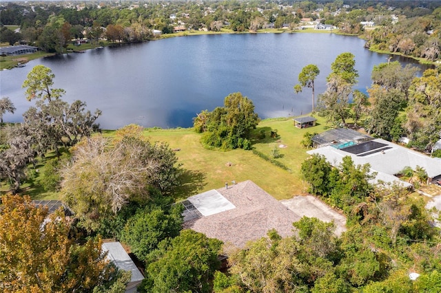 drone / aerial view with a water view