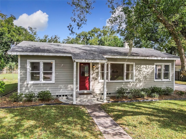 view of front of house with a front lawn