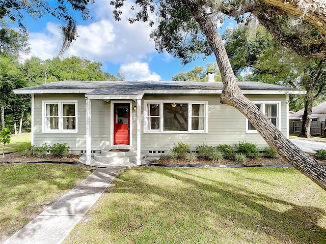 view of front of home with a front yard