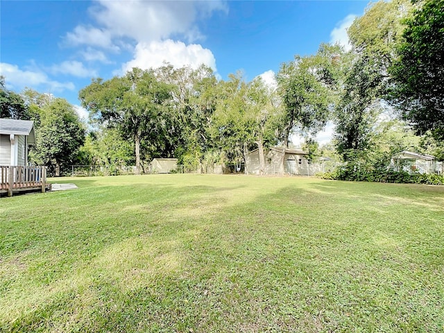 view of yard with a deck