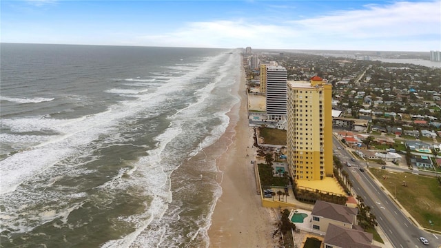 bird's eye view with a view of the beach and a water view