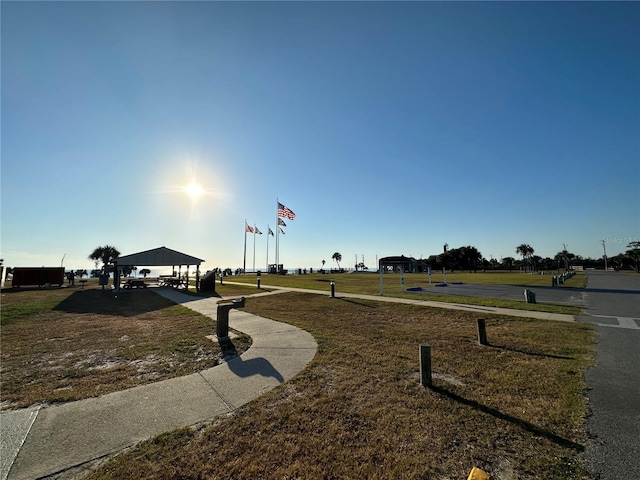 view of property's community with a gazebo and a lawn