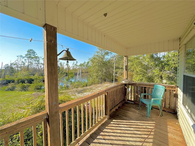 deck featuring a water view