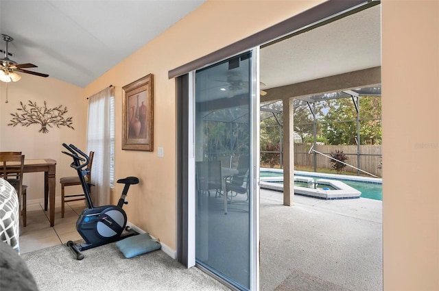 workout area with a swimming pool, carpet floors, and ceiling fan