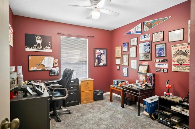 carpeted home office with ceiling fan