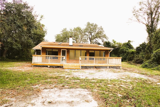 view of front of property featuring a deck