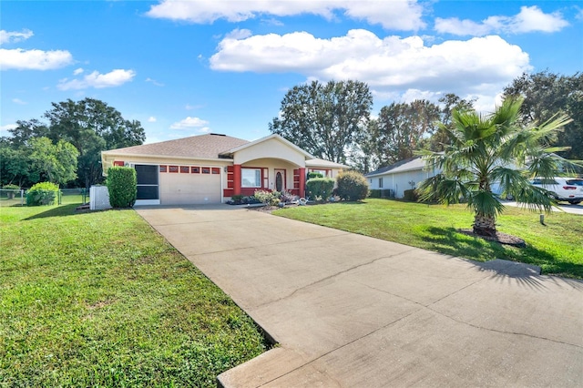 single story home featuring a garage and a front lawn