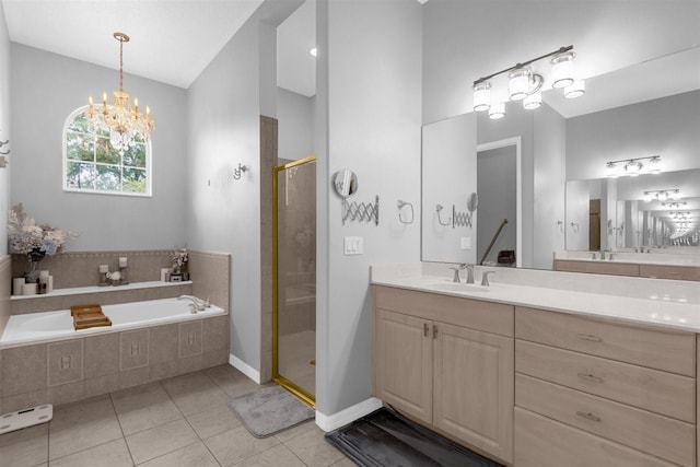 bathroom featuring vanity, a chandelier, tile patterned floors, and independent shower and bath