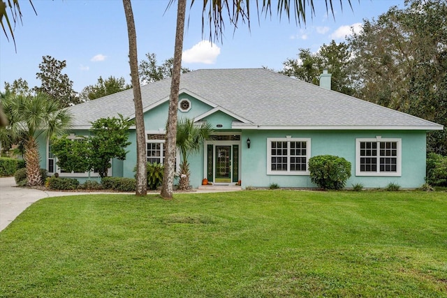 ranch-style house with a front yard