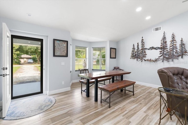 dining space featuring light hardwood / wood-style floors