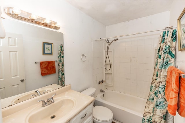 full bathroom featuring vanity, toilet, and shower / bath combination with curtain