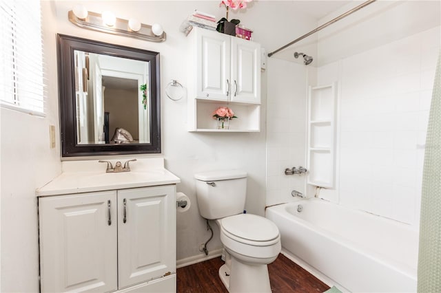 full bathroom with toilet, shower / tub combination, vanity, and hardwood / wood-style floors