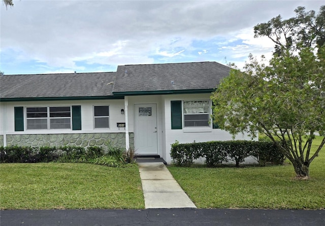 view of front of house with a front yard