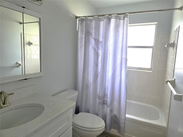 full bathroom featuring toilet, vanity, and shower / bath combination with curtain