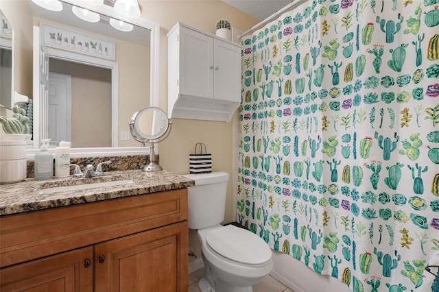 full bathroom with tile patterned flooring, shower / bath combo, vanity, and toilet